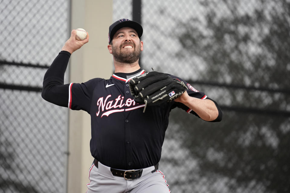 Washington Nationals pitcher Dylan Floro throws during a spring training baseball workout Sunday, Feb. 18, 2024, in West Palm Beach, Fla. (AP Photo/Jeff Roberson)