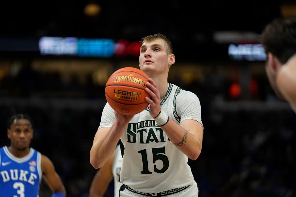 Michigan State center Carson Cooper takes a free throw during the second half against Duke in the Champions Classic at the United Center on Tuesday, Nov. 14, 2023, in Chicago, Illinois.