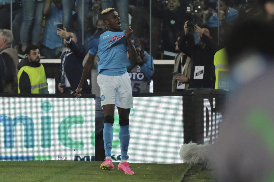 Napoli's Victor Osimhen celebrates scoring during the Serie A soccer match between Udinese and Napoli at the Dacia Arena in Udine, Italy, Thursday, May 4, 2023. (Andrea Bressanutti/LaPresse via AP)