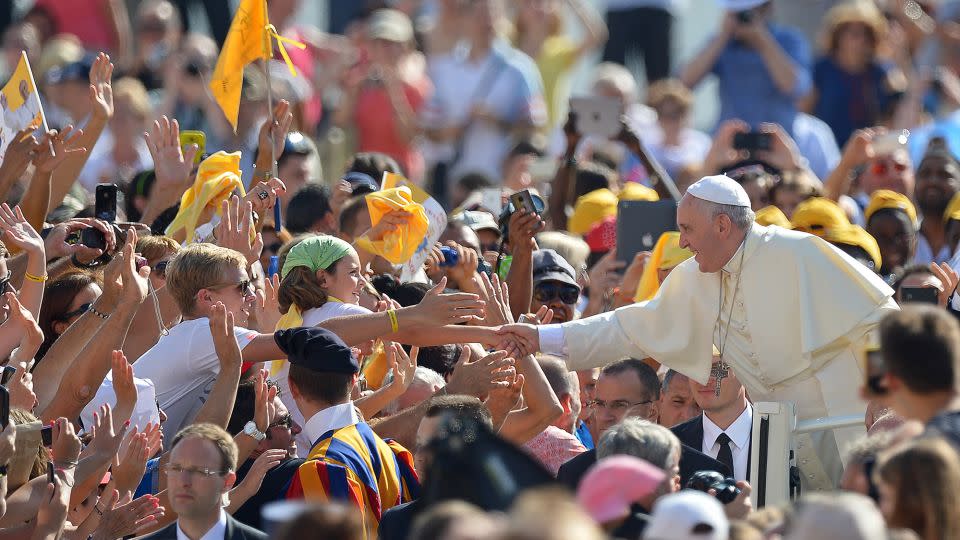 Pope Francis is greeted by well-wishers at St Peter's Square prior to his weekly general audience on August 27, 2014 in Vatican City. - Vincenzo Pinto/AFP/Getty Images