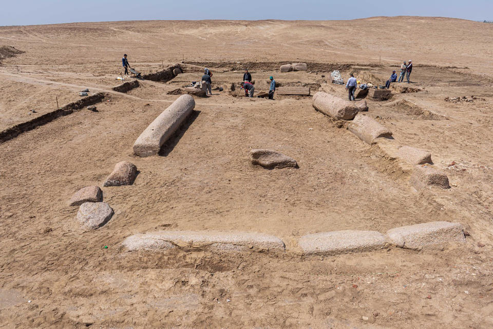 This undated photo provided by the Egyptian Tourism and Antiquities Ministry on Monday, April 25, 2022, shows archeologists working in the ruins of a temple for Zeus-Kasios, the ancient Greek god, at the Tell el-Farma archaeological site in the northwestern corner of the Sinai Peninsula. Tell el-Farma, also known by its ancient name Pelusium, dates back to the late Pharaonic period and was also used during Greco-Roman and Byzantine times. (Egyptian Tourism and Antiquities Ministry via AP)