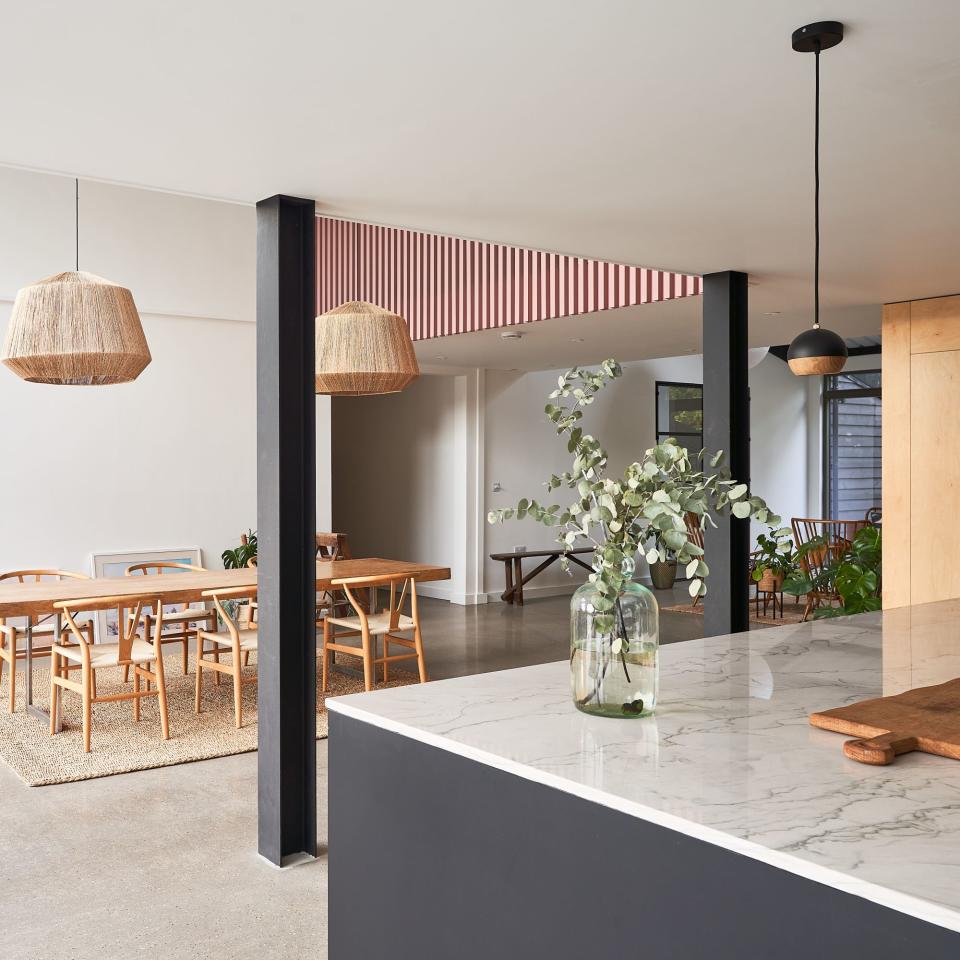 kitchen island and dining table in open plan kitchen diner