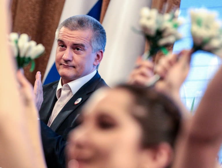 Moscow-installled Crimean leader Sergei Aksyonov, takes part March 16, 2018, in an event in Simferopol marking the fourth anniversary of Crimea voting to leave Ukraine and join Russia