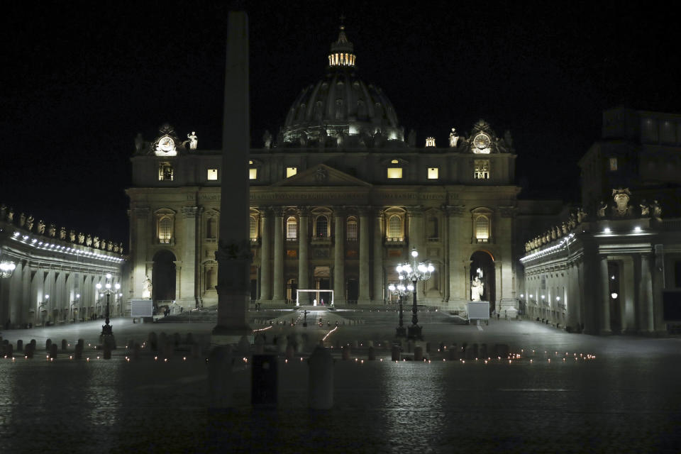 Pope Francis leads the Via Crucis – or Way of the Cross – ceremony in St. Peter's Square empty of the faithful following Italy's ban on gatherings to contain coronavirus contagion, at the Vatican, Friday, April 10, 2020. The new coronavirus causes mild or moderate symptoms for most people, but for some, especially older adults and people with existing health problems, it can cause more severe illness or death. (AP Photo/Alessandra Tarantino)