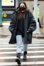 <p>Rosalía wears an oversize coat while out and about in N.Y.C. on Tuesday. </p>