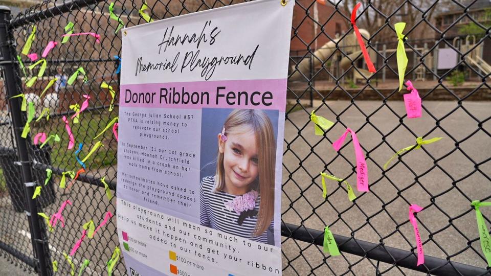 A banner marks Hannah's Memorial Playground Donor Ribbon Fence, Tuesday, April 12, 2022 at George Julian School 57.
