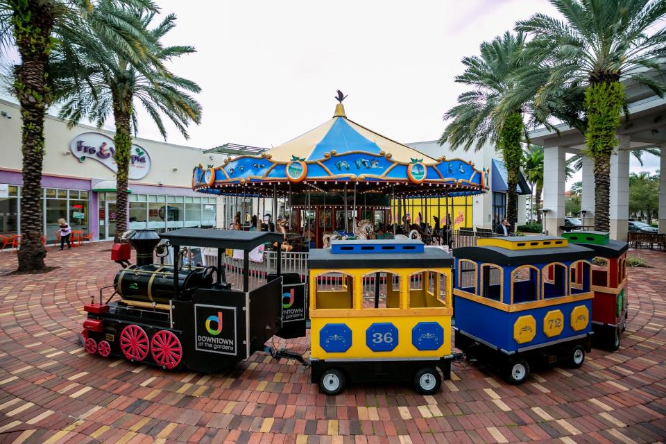 The popular carousel will return to Downtown Gardens but it'll be at a different spot. As for the mini train? Probably not.