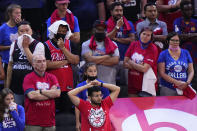 Philadelphia 76ers' fans watch the final minutes of Game 7 in a second-round NBA basketball playoff series against the Atlanta Hawks, Sunday, June 20, 2021, in Philadelphia. The 76ers face an uncertain future after an early exit in the playoffs. (AP Photo/Matt Slocum)