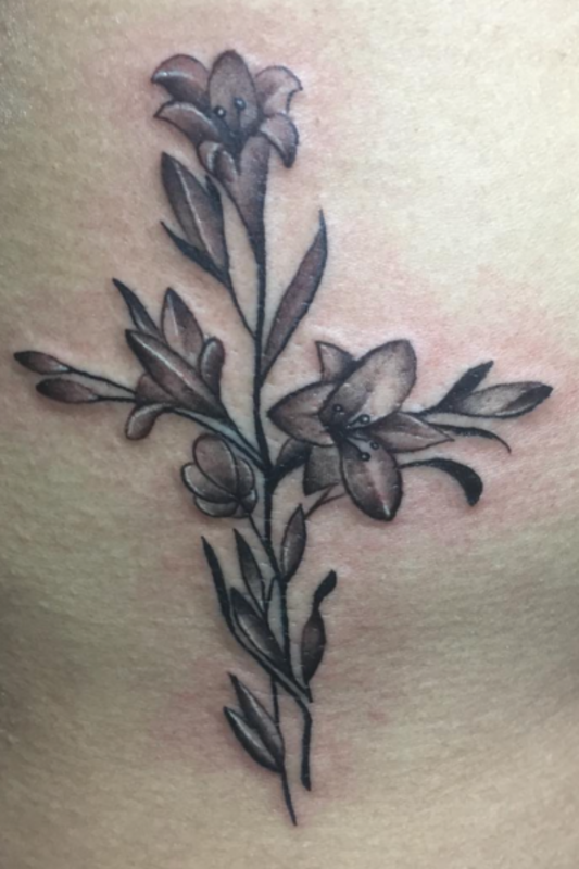 Floral cross tattoo <p>Geztattoo</p>