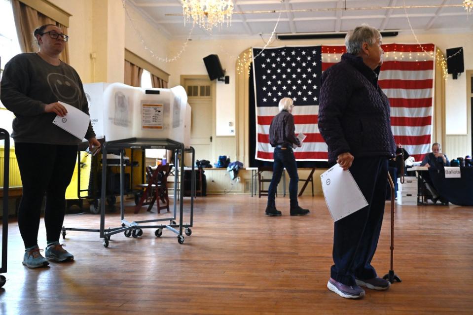 Voters wait to cast their ballots at the Old Stone School during the Super Tuesday primary in Hillsboro, Virginia, on March 5, 2024. AFP via Getty Images