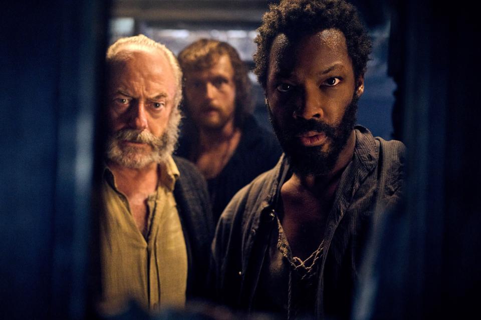 Liam Cunningham, Chris Walley and Corey Hawkins in The Last Voyage of the Demeter. (Rainer Bajo / © Universal Pictures / Courtesy Everett Collection)