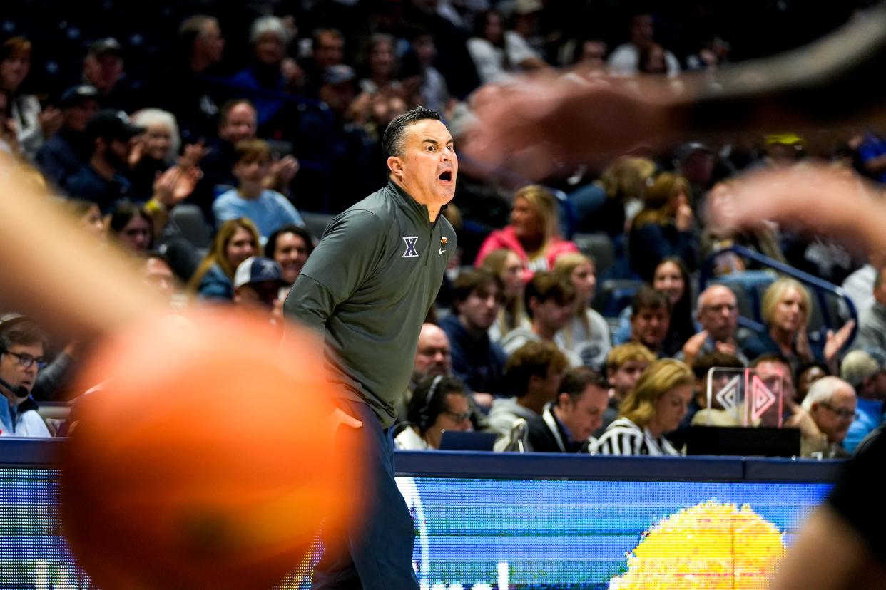 Xavier head coach Sean Miller yells onto the court in his team's matchup against Winthrop in the Skip Prosser Classic on Dec. 16, 2023. Xavier won the game, 75-59.