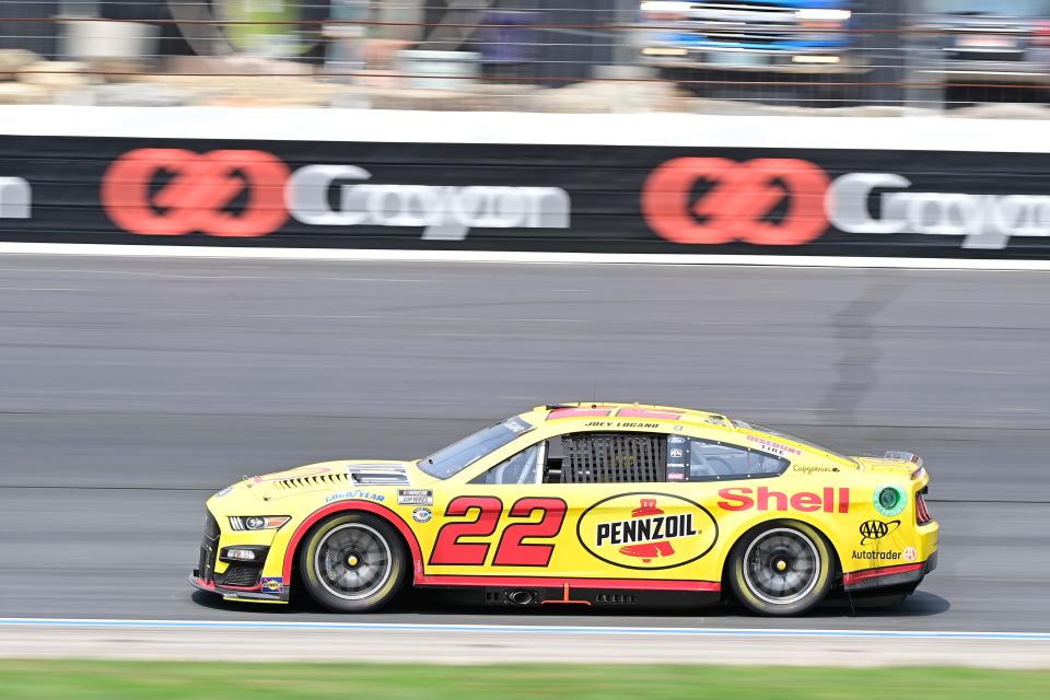 Jul 17, 2023; Loudon, New Hampshire, USA; NASCAR Cup Series driver Joey Logano (22) races into turn four during the Crayon 301 at New Hampshire Motor Speedway.