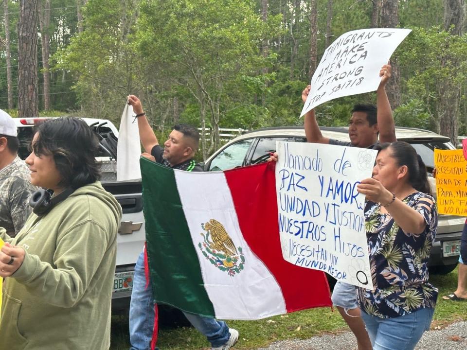 Protesters hold signs and shout against SB 1718 and Gov. Ron DeSantis as they march around the Mission San Jose of Saint Peter Church in Pierson, Thursday, June 1, 2023.