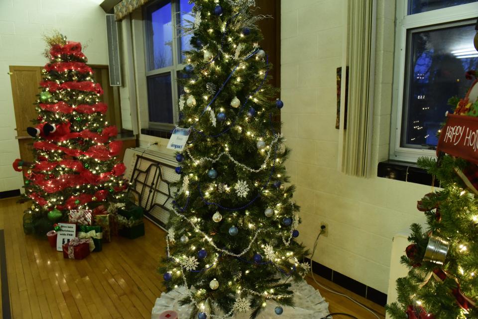 Christmas Tree Lane at St. Paul Lutheran Church displays Christmas trees decorated for Winesburg Christmas Weekend.