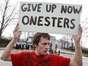 Jacob Knowles of Occupy Columbia joins other movements across the Midwest to protest against Monsanto's agricultural practices in front of the Missouri Botanical Garden during the "Occupy the Midwest" regional conference in St. Louis, Missouri March 16, 2012.