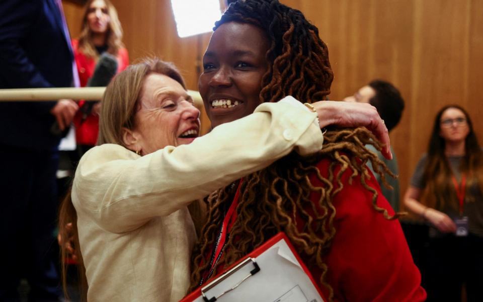 British Labour party supporters react to the announcements of wins during local elections - REUTERS