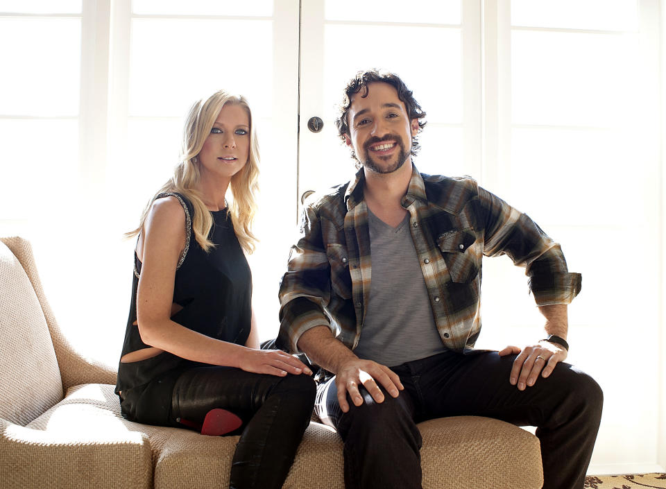 In this March 18, 2012 photo, actress Tara Reid, left, and actor Thomas Ian Nicholas pose for a portrait during a media day for the upcoming feature film "American Reunion" in Los Angeles. The film opens nationwide on Friday, April 6. (AP Photo/Dan Steinberg)