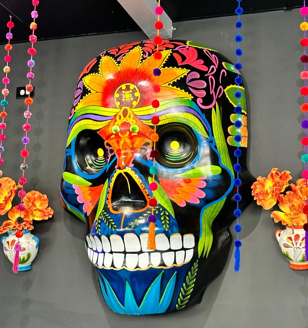 Blue Habanero showcases this larger-than-life mask in celebration of Mexican culture and heritage.