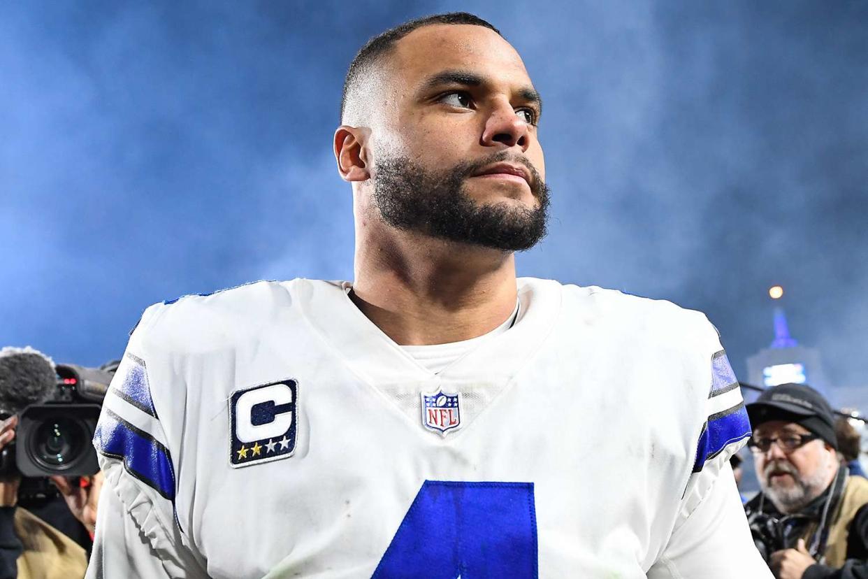 Quarterback Dak Prescott #4 of the Dallas Cowboys walks off the field after losing the NFC Divisional Round playoff game to the Los Angeles Rams at Los Angeles Memorial Coliseum on January 12, 2019 in Los Angeles, California.