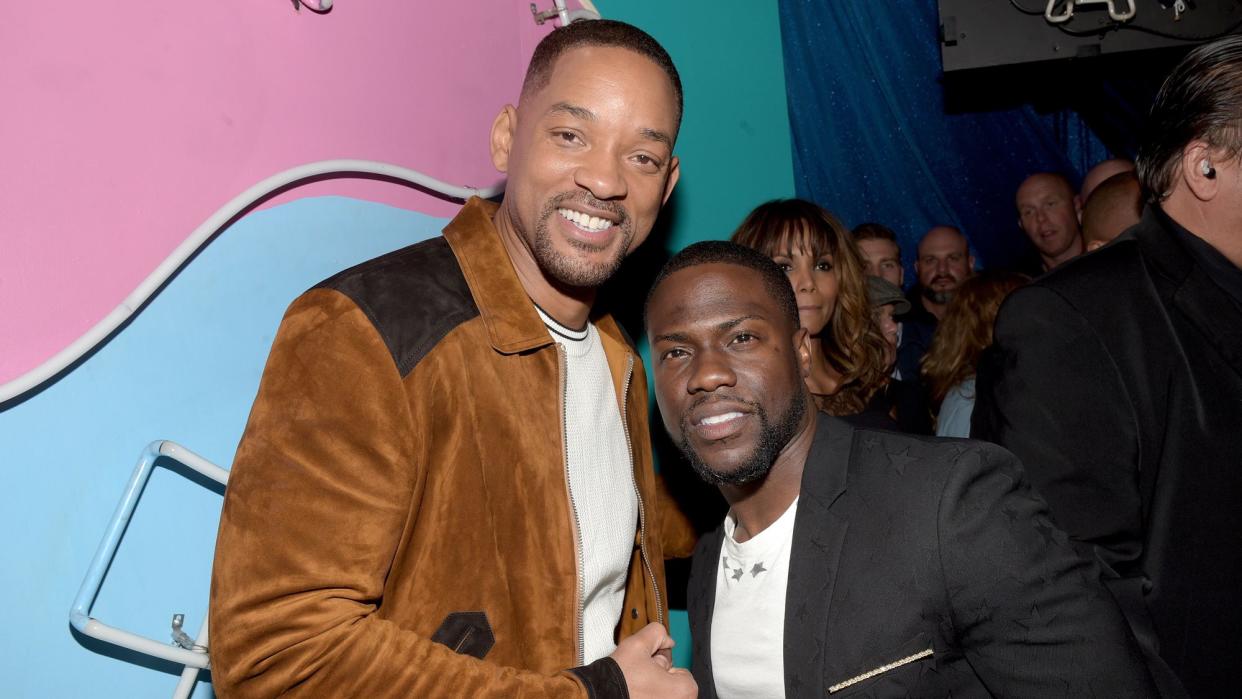 MTV Generation Award Honoree Will Smith (L) and host Kevin Hart pose backstage at the 2016 MTV Movie Awards at Warner Bros. Studios on April 9, 2016 in Burbank, California. MTV Movie Awards airs April 10, 2016 at 8pm ET/PT.