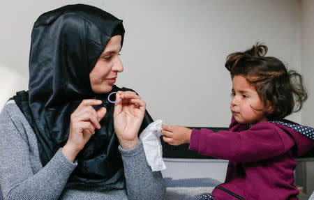 Syrian Ghufran al-Khalaf (L) and her daughter Shadin are seen at home in Wecker, Luxembourg, January 19, 2017. Picture taken January 19, 2017. REUTERS/Yves Herman