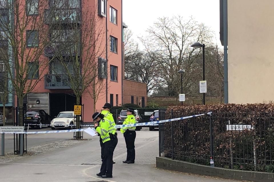A police cordon outside a block of flats in Isleworth after a teenager was found fatally stabbed (PA)