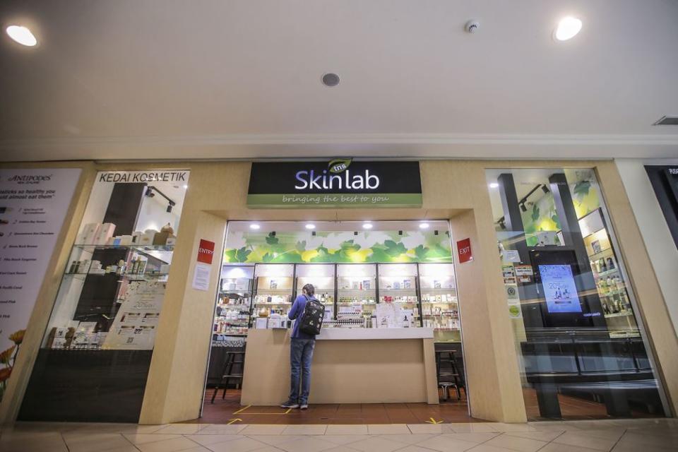 Beauty and skincare outlets such as Mid Valley’s TNS Skinlab said they are open to primarily facilitate online orders and potential walk-ins. — Picture by Hari Anggara