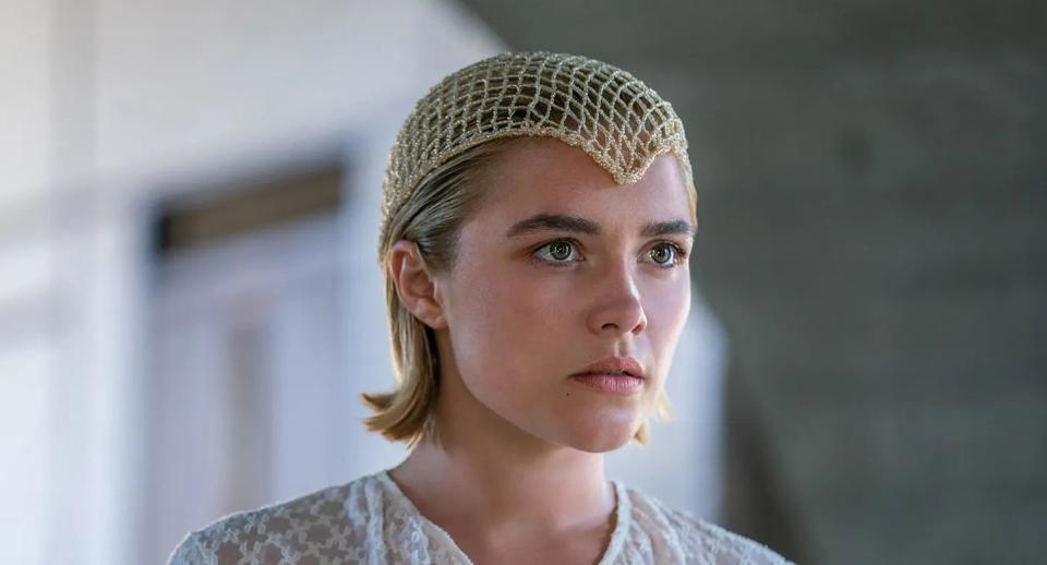 Florence Pugh in a head dress