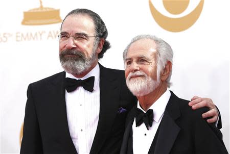 Actor Mandy Patinkin (L) from Showtime's "Homeland" arrives with his father Lester Patinkin at the 65th Primetime Emmy Awards in Los Angeles September 22, 2013. REUTERS/Mario Anzuoni (UNITED STATES Tags: ENTERTAINMENT) (EMMYS-ARRIVALS)
