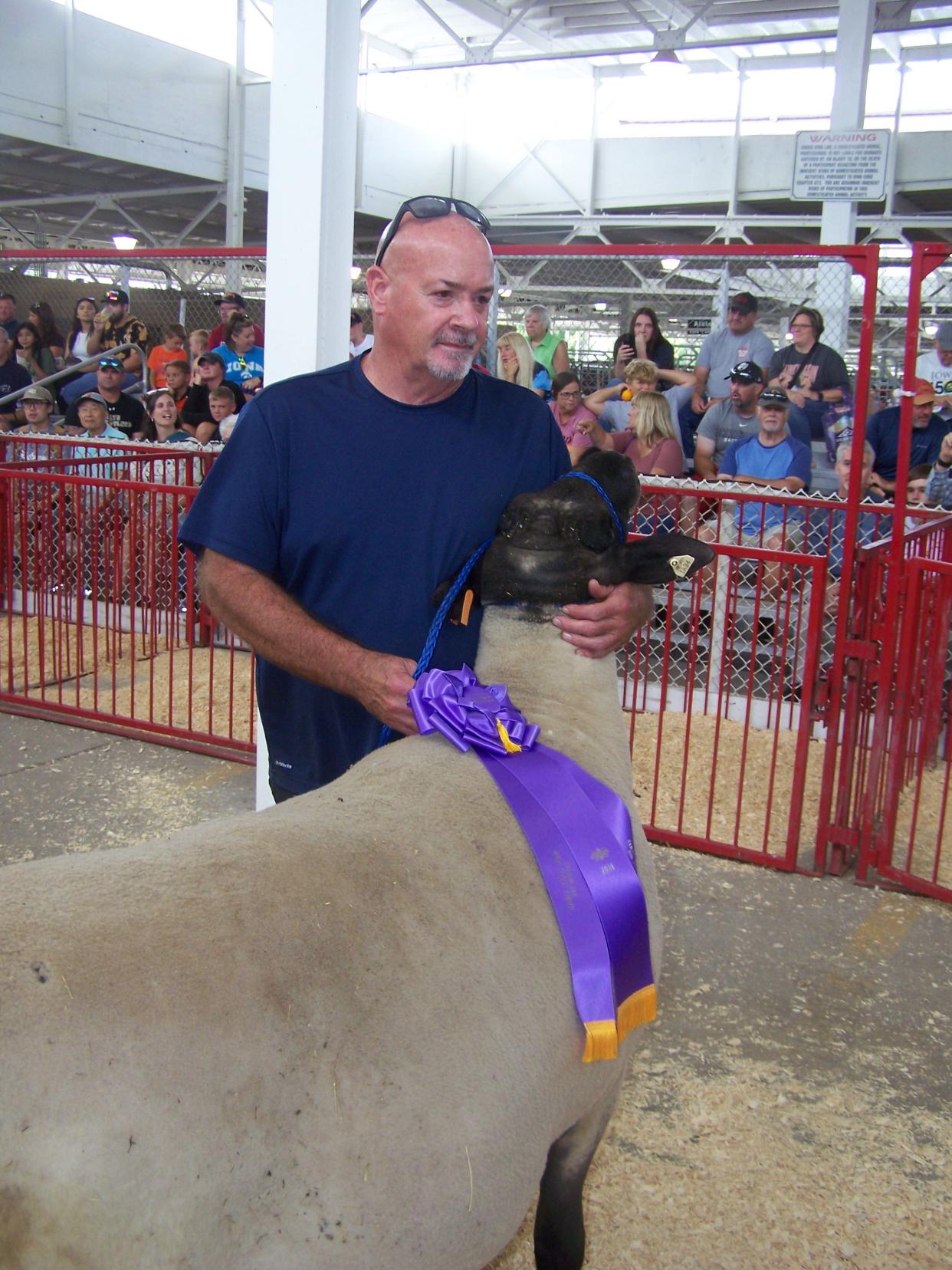 Craig Fetters of rural Lucas took the crown for Big Ram at the Iowa State Fair on Thursday with Whip weighing 498 pounds.