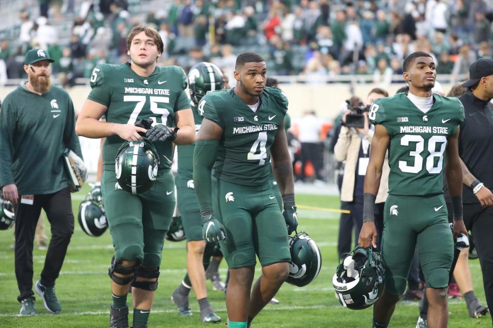 Michigan State's Jacoby Windmon (4) walks off the field after the 34-7 loss to the Minnesota Golden Gophers at Spartan Stadium, Saturday, Sept. 24, 2022.