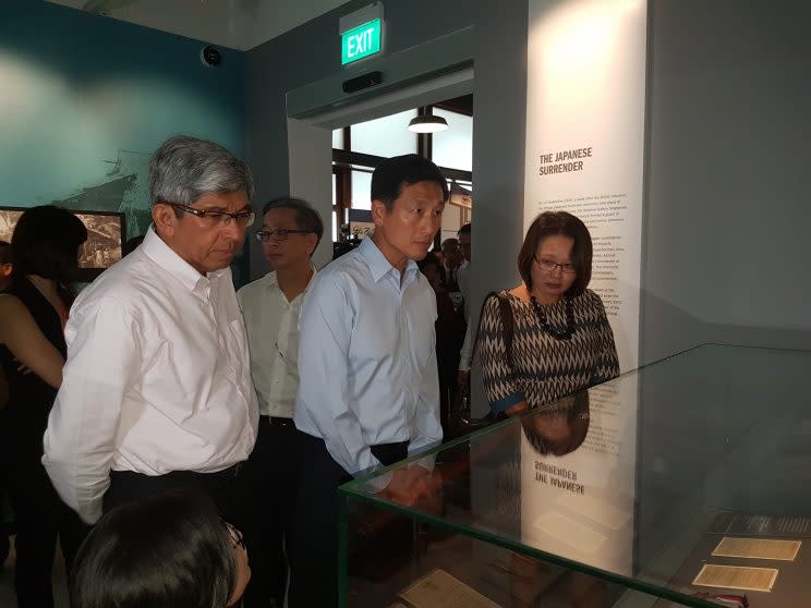 Minister for Communications and Information, Yaacob Ibrahim (second from left), Minister for Education and Second Minister for Defence, Ong Ye Kung (middle), and Workers’ Party Chairman and Aljunied GRC MP, Sylvia Lim (right), looking at exhibits at the Syonan Gallery: War and Its Legacies. (Yahoo Singapore photo: Safhras Khan)