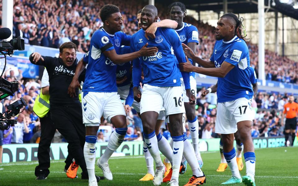 Abdoulaye Doucoure of Everton celebrates scoring a goal to make the score 1-0 with his team-mates during the Premier League match between Everton FC and AFC Bournemouth at Goodison Park - Getty Images/Chris Brunskill