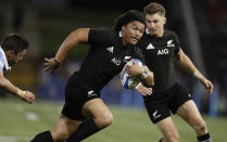 New Zealand's Caleb Clarke run sat the defence during the Tri-Nations rugby test between Argentina and the All Blacks in Newcastle, Australia, Saturday, Nov. 28, 2020. (AP Photo/Rick Rycroft)