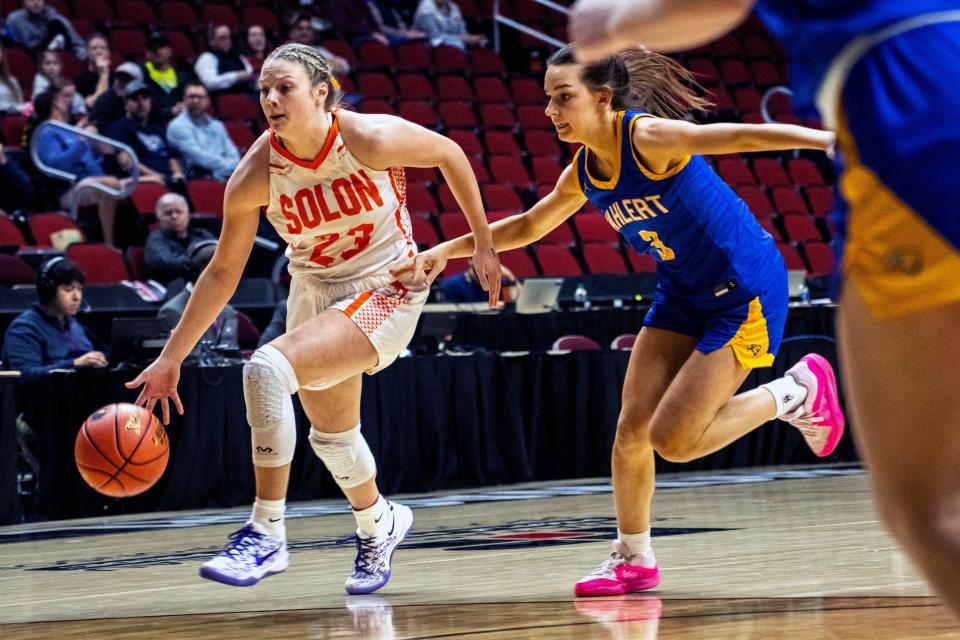 Solon's Callie Levin drives to the basket against Dubuque Wahlert's Olivia Donovan during the Iowa high school girls state basketball quarterfinals at Wells Fargo Arena on Tuesday. The win pushes the Spartans into the state semifinals on Thursday.