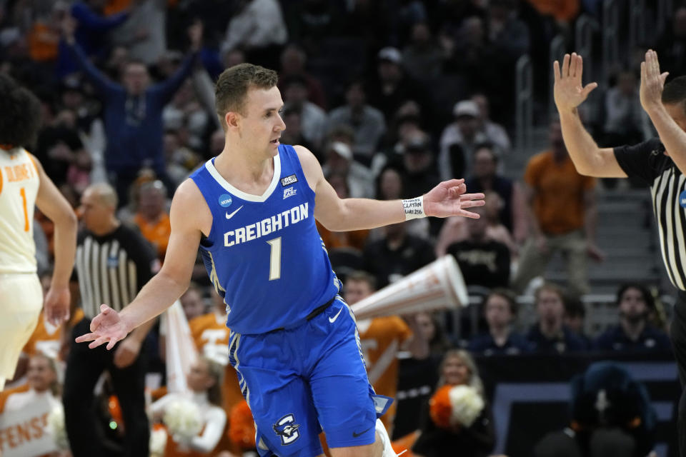 Creighton guard Steven Ashworth reacts after a three-point basket during the first half of a Sweet 16 college basketball game against Tennessee in the NCAA Tournament, Friday, March 29, 2024, in Detroit. (AP Photo/Paul Sancya)