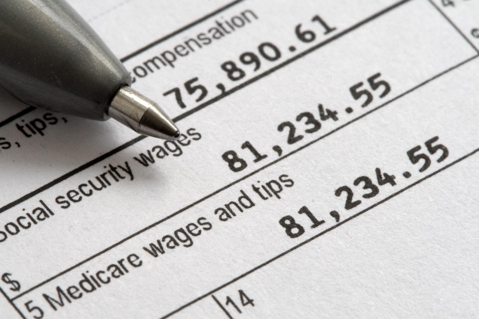 A W-2 tax form highlighting wages that have been subject to Social Security and Medicare taxation.