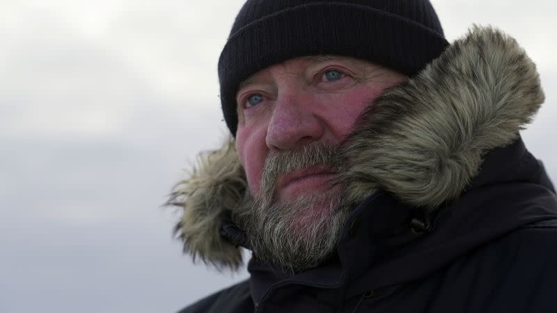 Ice navigator Paul Ruzycki of Canada looks on aboard the Greenpeace's "Arctic Sunrise" ship in the middle of the Arctic Ocean