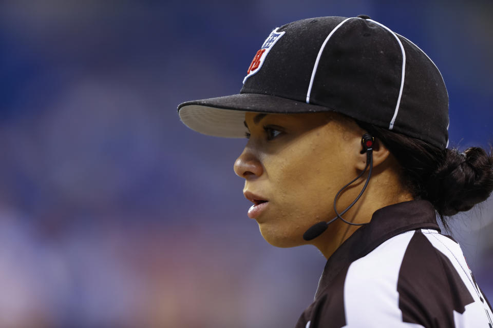 Maia Chaka in NFL referee hat.