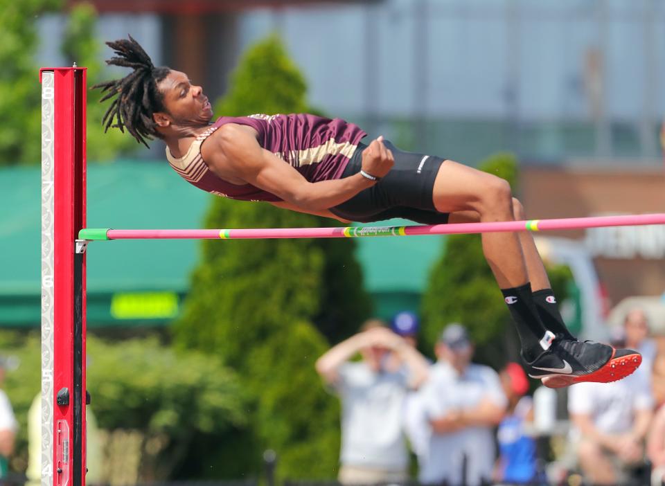 Garfield's Markeise Smith clears 6' 5" in the high jump event at the OHSAA Division III state track & field championships on Saturday, June 3, 2023 in Columbus, Ohio, at Jesse Owens Memorial Stadium.