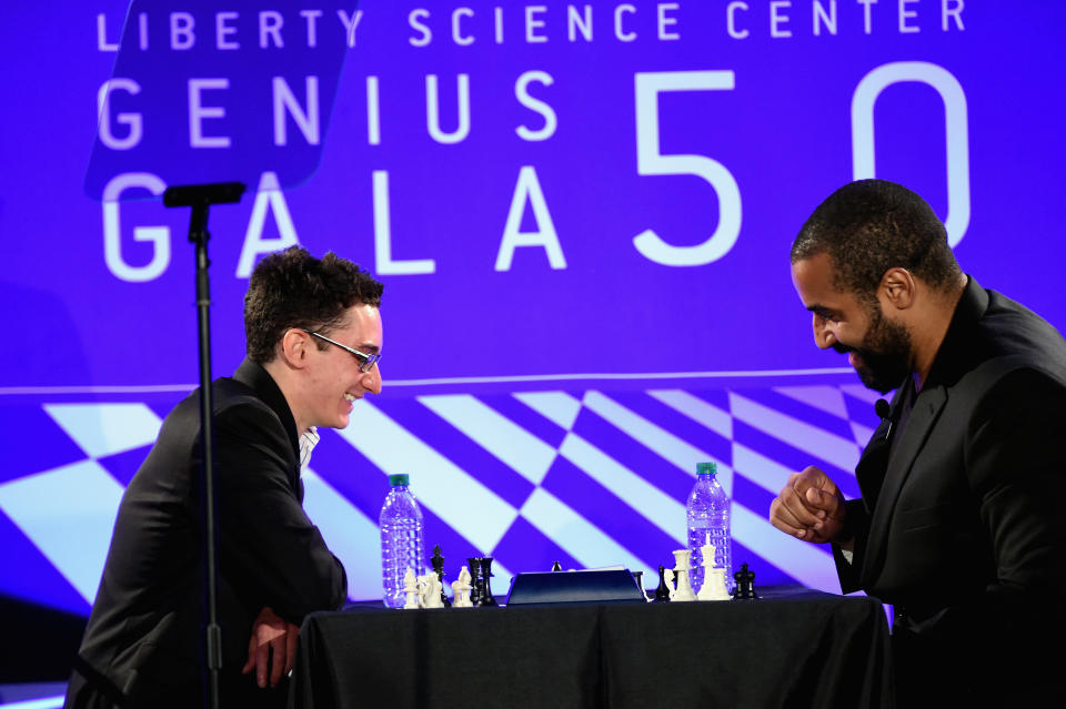 John Urschel faces Grandmaster Fabiano Caruana, one of the top 10 players in the world,&nbsp;at the Liberty Science Center's Genius Gala on May 20, 2016 in Jersey City, New Jersey. (Photo: Mike Coppola via Getty Images)