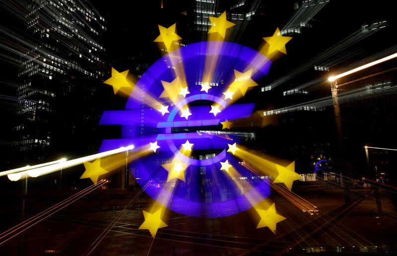 FILE PHOTO: The euro sign is photographed in front of the former headquarters of the European Central Bank in Frankfurt