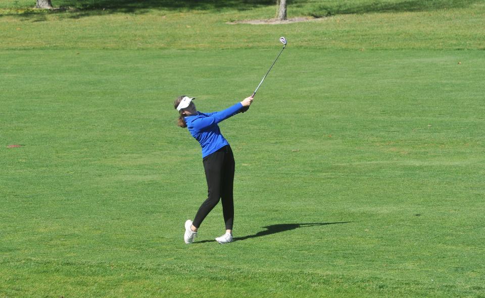 Wynford's Melanie Johnson hits an approach shot from the fairway of No. 5 at Sycamore Springs Golf Course in the Division II district tournament.