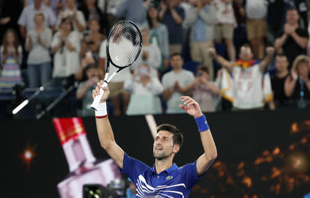 Tennis - Australian Open - Fourth Round - Melbourne Park, Melbourne, Australia, January 22, 2019. Serbia's Novak Djokovic celebrates after winning the match against Russia's Daniil Medvedev. REUTERS/Kim Kyung-Hoon