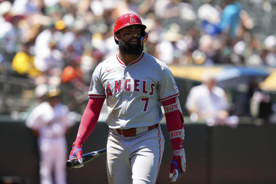 Los Angeles Angels' Jo Adell walks to the dugout after striking out against the Oakland Athletics during the fifth inning of a baseball game Thursday, July 4, 2024, in Oakland, Calif. (AP Photo/Godofredo A. Vásquez)