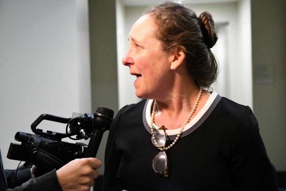 Jennifer Portman responds to questions from the media after the guilty verdicts have been delivered in the trial against Denise Williams for the murder of her husband Mike Williams, Friday, Dec. 14, 2018.