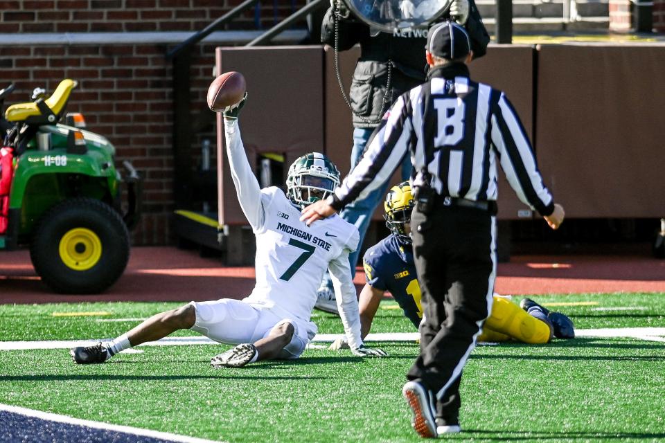 Michigan State's Ricky White catches a pass on the sideline against Michigan during the fourth quarter on Saturday, Oct. 31, 2020, at Michigan Stadium in Ann Arbor.