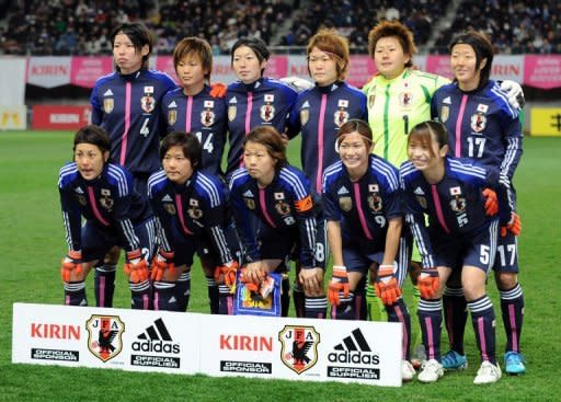 File photo shows Japan's players posing for a photo prior to a match at Kirin Challenge Cup in Sendai, Japan, in April. It has been revealed that Japan's world champion women footballers were seated in premium economy while their male colleagues enjoyed business class on a flight to Europe for the Olympics