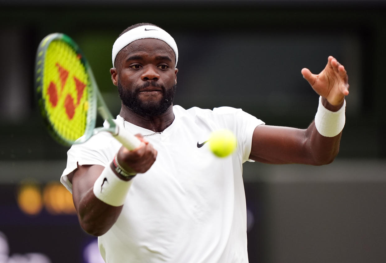 Frances Tiafoe in action against Carlos Alcaraz (not pictured) on day five of the 2024 Wimbledon Championships at the All England Lawn Tennis and Croquet Club, London. Picture date: Friday July 5, 2024. (Photo by Zac Goodwin/PA Images via Getty Images)